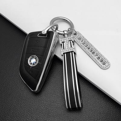 China Protect Original Car Key FOB Cover Original Embossed Leather Key Case For BMW Key Covers for sale