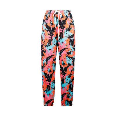 China Breathable Breathable Graphic Print Tapered Pants Multi Color Mid Waist Elastic Fashion Pants Regular Fit Women Casual Pants for sale