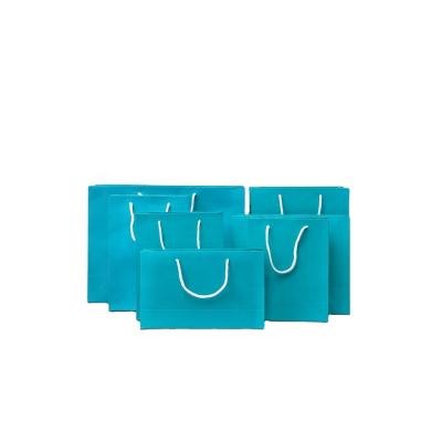 China High Quality Recycled Materials Tote Bags Shopping Bag Custom Different Size Blue Paper Bags With Handles For Party Shopping Packaging for sale