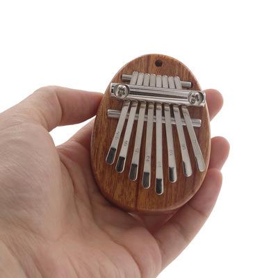 China Transparent Crystal Acrylic Piano Kalimba Music Enlightenment Thumb Instrument 8 Keys Mini Thumb Piano for sale