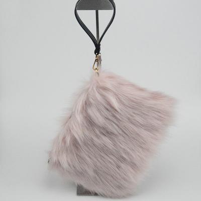 China Luxury Fluffy Fox Fur Chain Purse Newest Wholesale Reusable Ladies Keep Hand Warmer Winter Multicolor Natural Fox Fur Purse For Women for sale