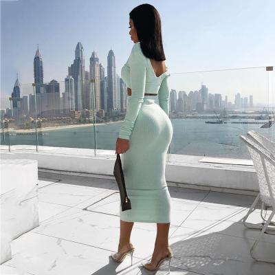 China Anti-static sexy two-piece set long sleeve crop top v-neck top skirt set women outfits party summer two-piece clothes for sale