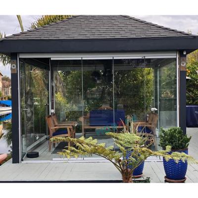 China Modern aluminum sunroom garden glass house/Frameless sliding seasonal frameless aluminum glass balcony folding door sunroom panoramic fold door for sale