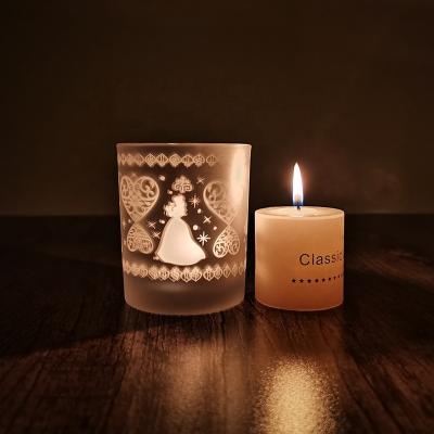 China Home decoration new design candle container with lid laser princess pattern frosted candle glass jar for sale