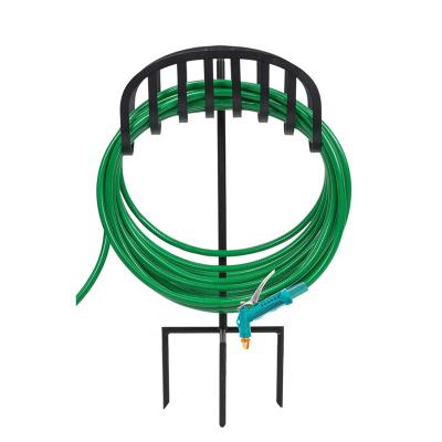 China Amazon Hot Sale Anti-Abrasion Garden Manger Style Metal Garden Hose Holder Swirls Black Water Hose Holder Rack Durable for sale