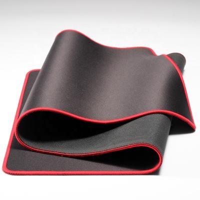 China Durable Mouse Pad With PremiumStitched Edge Non-Slip Rubber Base Mouse Pad for sale