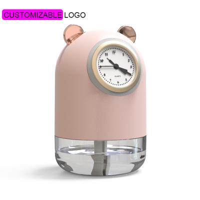 China Creative Clock and Household Spray Moisturizing Creative USB Charging Board Pension Office Spray Gifts Humidifier for sale