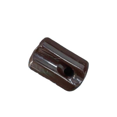 China Brown Porcelain Voltage Insulator 502/504 Porcelain Stay Insulator Power Line Electrical Material for sale