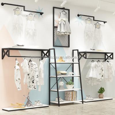 China Clothing Store Children's Clothing Stores Interior Design Child Garment Wall Display Rack Kids Clothing Display Stand for sale