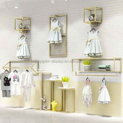 China Clothing Store Children's Clothing Stores Interior Design Child Garment Wall Display Rack Showroom Clothing Rack for sale