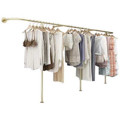 China Clothing Store Boutique Clothes Shop Rack Wall Mounted Store Garment Cloth Display Dress Dress Metal Gold Luxury Clothing Racks for sale