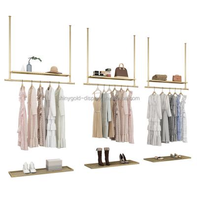 China Clothes shop modern wall mount clothing display rack retail garment store decoration for clothing store for sale