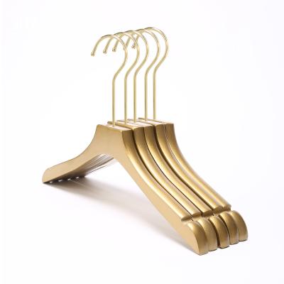 China Gold Logo Clothes Shop Wooden Luxury Solid Wood Clothing Hanger Non Slip Minimalist Coat Hanger Custom Cloths Clip With Gold Hooks for sale