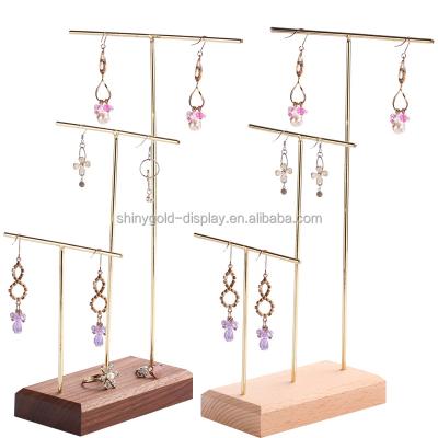 China Reusable Metal and Wooden Fashion Jewelry Display Stand Earring Holder Stand with Wooden Base and Gold Finishing for sale