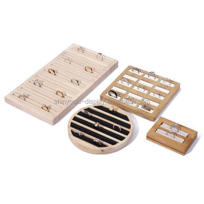 China Custom Multifunctional Bamboo Round Rings Tray For Counter Showcase Jewelry Store Square Jewelry Display Rack for sale