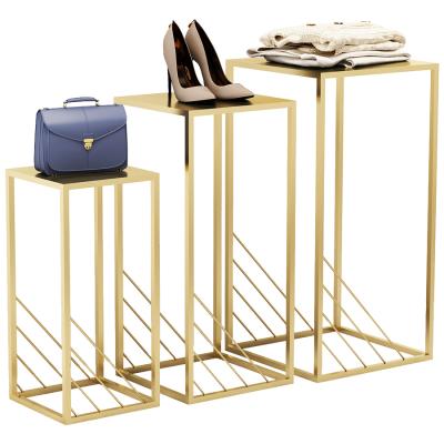 China Golden Retail Stores Stainless Steel Frame Shoe Bag Display Tables Rack Boutique Store Furniture for sale