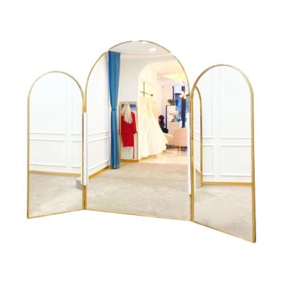 China Large mirror minimalist custom triple arched wedding dress fitting mirror stainless steel floor standing full length mirror for shop for sale