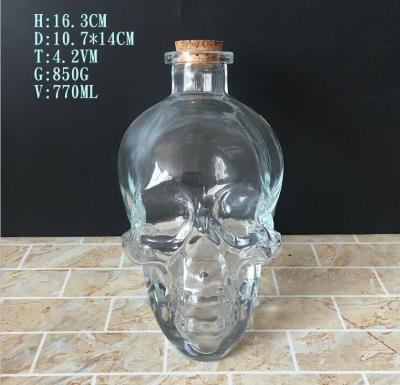 China Wine Factory Supply Skull Glass Bottle for sale