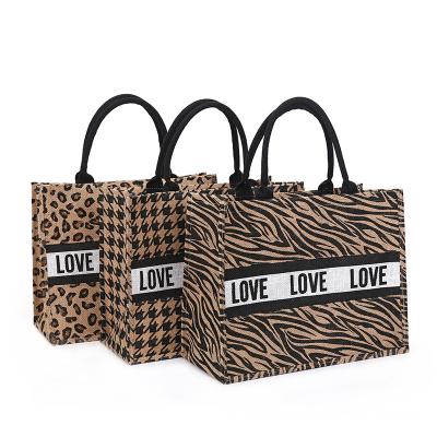 China Other 2022 Summer Luxury Jute Women Handbags For Beach Vintage Swallow Hoop Printing Shoulder Bags Daily Use Leopard Beach Female Bag for sale