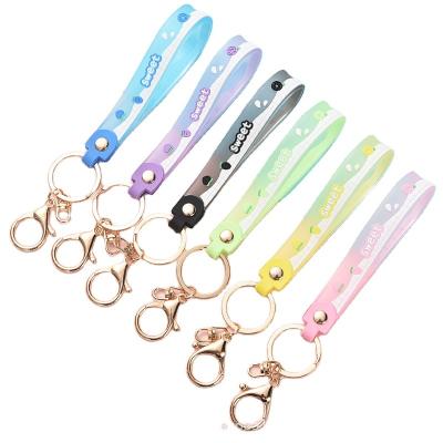 China Baby luxury diy fresh sweet fruit new arrival jelly silicone strap key chain floating head chain strap for dolls for sale