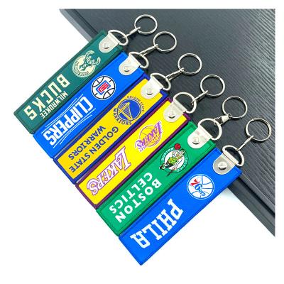 China nba basketball team luxury high quality custom fashion embroidered woven fabric throw label key chain for sale