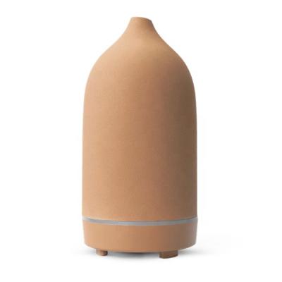 China Quick Release Terracotta Stone Humidifying Oil Diffuser 160lm Ceramic Packaging And Logo OEM for sale