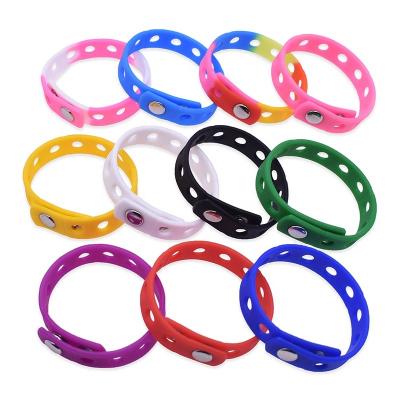 China Other New Arrival Custom Cartoon PVC Charm Silicone Wristband Soft Rubber Wristband With Charms for sale