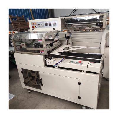 China Hotels Factory Supply Automatic Soft Towel Heat Shrink Cutter Wrap Machine for sale