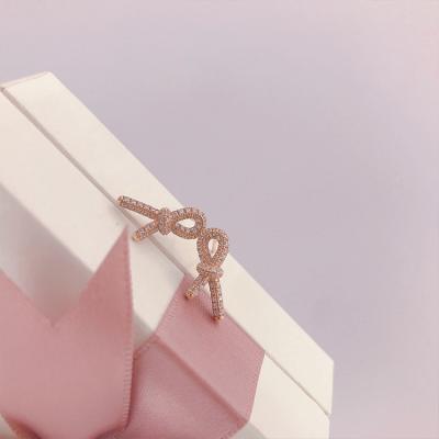 China Vintage Thin And Elegant Lightweight Luxury Rose Gold Knot Shape Ear Piercing Studs for sale