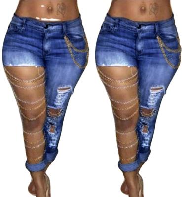 China Breathable Big Hole Denim Ladies Jeans Pants Stretches Ripped Jeans Women Wholesale With Chains for sale