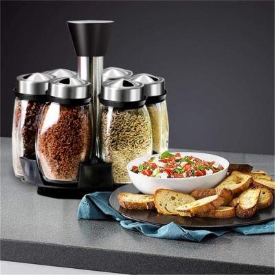 China Sustainable 6 Piece Glass Spice Jar Set With Plastic Revolving Rack Kitchen Set for sale