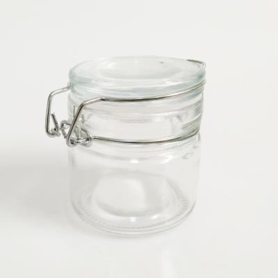 China Mini Round 120ml Sustainable Clear Kitchen Storage Glass Spice Jar Container With Airtight Lids for sale