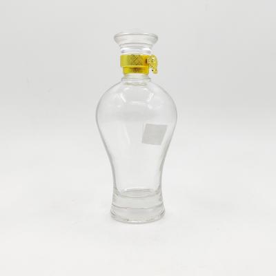 China Luxury Beverage 500ml XO Whiskey Glass Wine Bottle With Glass Lid for sale