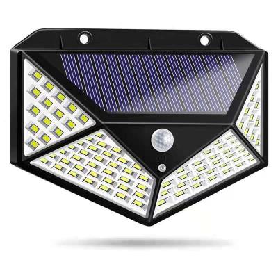 China 100 LED Solar Garden Light 4 Sides 3 Modes Outdoor Waterproof Illumination Motion Sensor Garden Led Interaction Solar Wall Lamp for sale