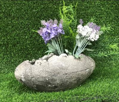 China Europe Small Home Garden Ornament Rugby Ball Flower Pot Layout Sculpture Resin Art Craft Advanced for sale