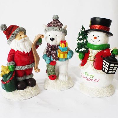 China Customized Europe and America Led Decoration Resin Christmas Doll Resin Sculpture LED Light Christmas Decoration for sale