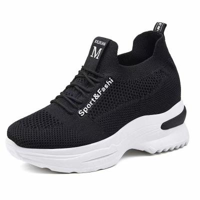 China Fashion trend wholesale custom brand women sneaker black and white women air cushion running for women sport running shoes with knit upper for sale