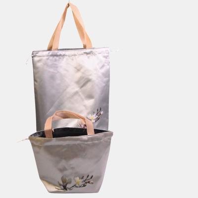 China Portable Custom spring and summer handbag convenient travel wear with custom embroidered logo for sale