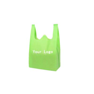 China Recyclable Multi-color non-woven grocery shopping Vest Bag with Logo Custom Printed T-shirt bags with customized logo pattern for sale