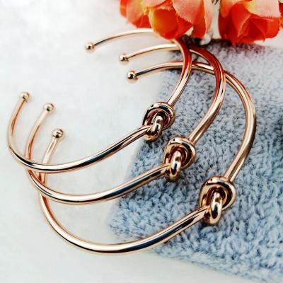 China AmorYubo New Style Stainless Steel Rose Gold Love Knot Bangle Bracelet Beautiful Brass Environmental Friendly Jewelry Factory Direct Sales for sale