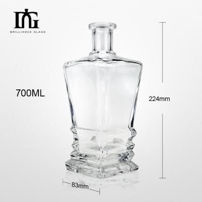 China Collar Material Glass Spirit Bottle Design Square Custom Engraved Beverage Cork Bottle for sale