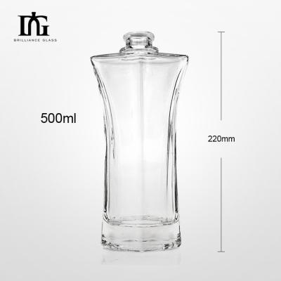 China Glass Beverage Bottle with Gold Cork Screw Cap Transparent Vodka Glass Bottle Beer for sale