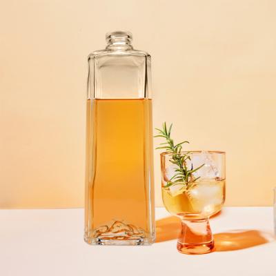 Chine Bouteilles de verre rondes de 500 ml pour tequila, whisky, gin, rhum, cognac et vodka gravés sur la surface à vendre