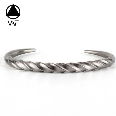 China Personalized Retro Vintage VAF Spiral Twist Bangle Cuff Bangle Punk Mens Womens Stainless Steel Bangle for sale