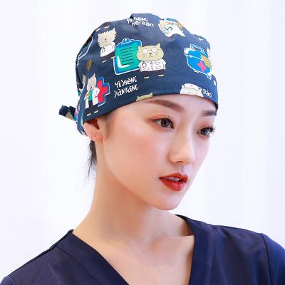 China Cartoon Printing Breathable And Comfortable Adjustable Nursing Scrub Hats Wholesale Breathable Medical Uniform Caps With Button for sale