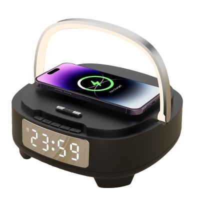 China Wireless Fast Charger with Night Light Bluetooth Speaker and Alarm Clock 9V/2A Input en venta