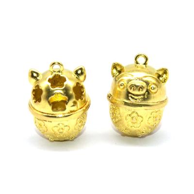 China China DIY Cast Copper Mental Hollow Hog Shape Golden Bell Jewelry Pendant for sale