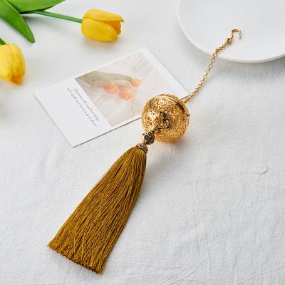 China China Hot Sale DIY Aromatherapy Zinc Alloy Hollow Ball With Tassel Interior Decoration Car Pendant Hanging for sale