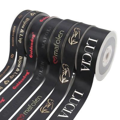 China Sustainable Wholesale Double Faced Custom Colors Embossed Printed Black Polyester Satin Ribbon With Logo for sale