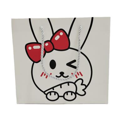 China Recyclable White Cardboard Box Paper Bag Gift Wholesale Gift Bags Small Rabbit Cute Advertising for sale